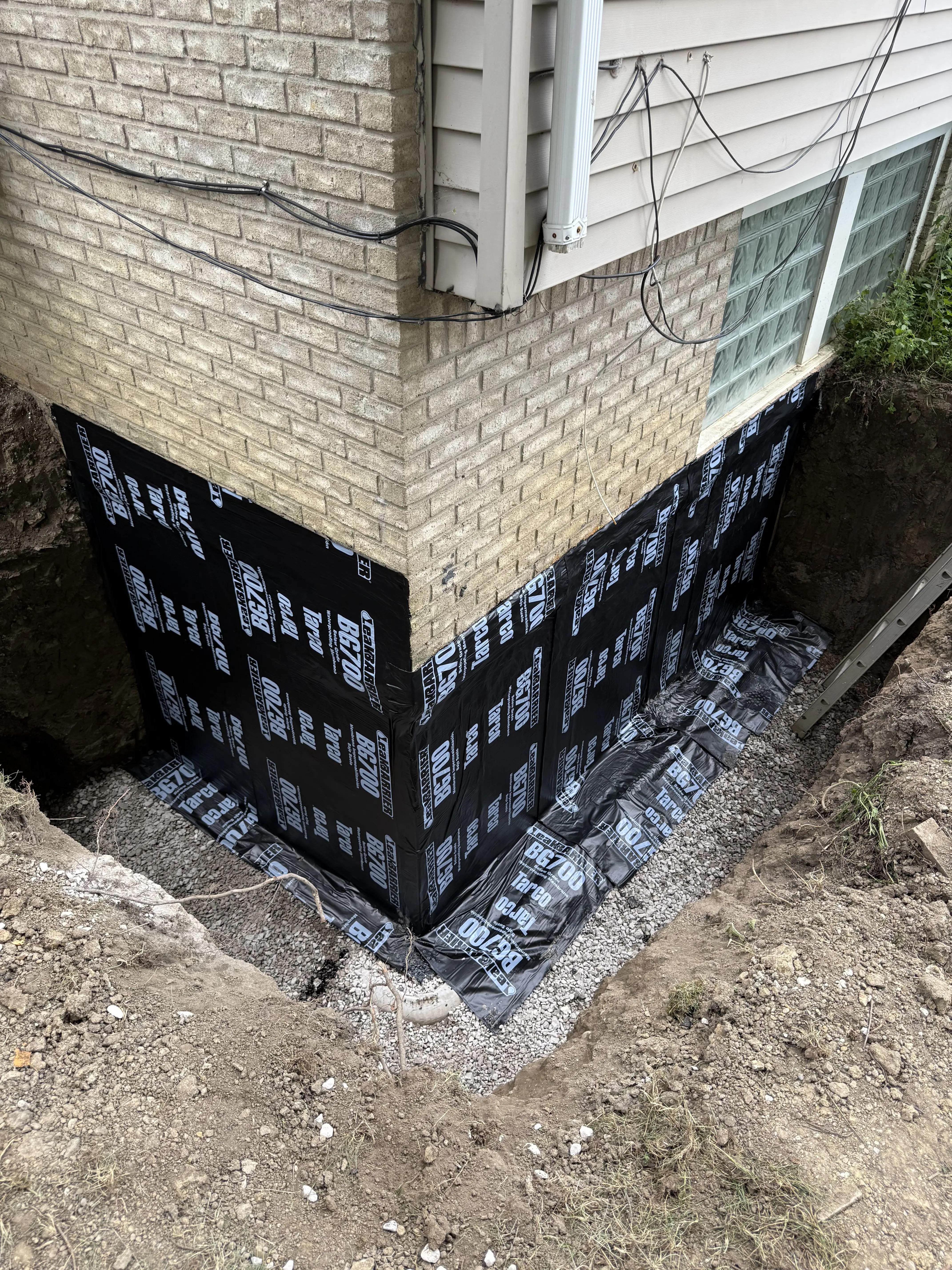 Completed exterior waterproofing system